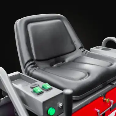 Black operator seat of the trowel with switches on the console beside it