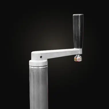Black handle of the blade angle crank mounted on a grey column