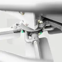 Rotor arm joint with grease nipples with green caps under the blade